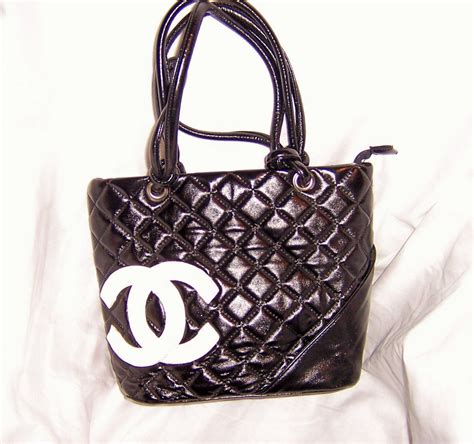 chanel black purse with white cc